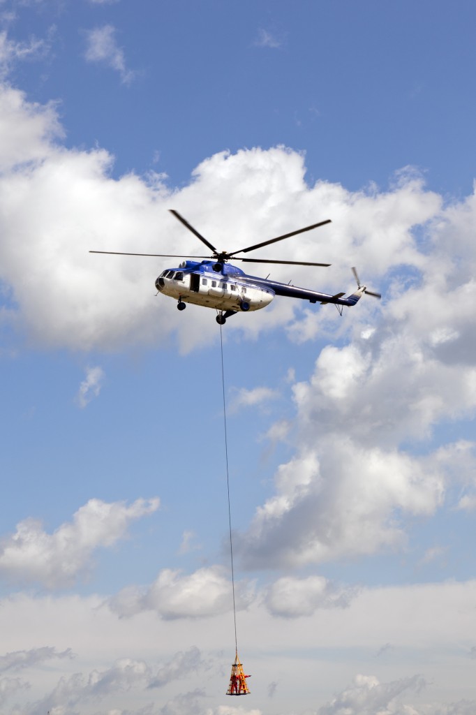 http://www.dreamstime.com/royalty-free-stock-photo-rescue-helicopter-air-human-cargo-hanging-fom-rope-image31204735
